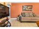 Comfortable living room with stylish furniture, tile flooring, and a relaxing atmosphere at 9410 Cedar Ct, Thornton, CO 80229