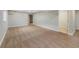 Finished basement space featuring carpet flooring, and neutral colored walls and trim at 7746 S Harrison Cir, Centennial, CO 80122