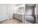 Bathroom featuring double sinks and vanity with tile flooring at 5395 Canyon View Dr, Castle Rock, CO 80104