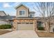 Charming two-story home with stone accents and a two-car garage at 5395 Canyon View Dr, Castle Rock, CO 80104
