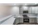 Stylish kitchen with stainless steel appliances and quartz countertops at 5395 Canyon View Dr, Castle Rock, CO 80104