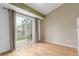 Inviting room with hardwood floors, sliding door access to backyard at 5307 E Courtney Ave, Castle Rock, CO 80104