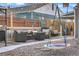 Inviting backyard with comfortable seating, string lights, and a fun disc swing for relaxing and entertaining at 3270 S Galapago St, Englewood, CO 80110
