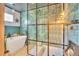 Modern bathroom featuring a freestanding tub, glass-enclosed shower, and stylish tile work at 3270 S Galapago St, Englewood, CO 80110