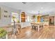 Spacious dining room with a rustic dining table and a cozy breakfast nook, perfect for gatherings at 3270 S Galapago St, Englewood, CO 80110