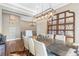 Dining room featuring a modern chandelier, dining table and chairs with a decorative mirror in the background at 9563 Red Primrose St, Franktown, CO 80116