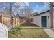 Well-maintained backyard lawn, perfect for outdoor activities at 826 Madison St, Denver, CO 80206