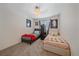Cozy bedroom featuring two twin beds, neutral walls, and a ceiling fan for added comfort at 8414 Coralberry Ct, Parker, CO 80134