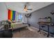 Bright bedroom with unique decorations and a ceiling fan to keep you cool at 8414 Coralberry Ct, Parker, CO 80134
