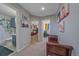 Hallway with carpeted floors providing access to bedrooms and a bathroom with a shower at 8414 Coralberry Ct, Parker, CO 80134