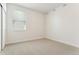 Simple bedroom with neutral carpet and window at 42976 Colonial Trl, Elizabeth, CO 80107