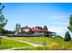 Spacious clubhouse with red roof and golf carts at 42976 Colonial Trl, Elizabeth, CO 80107