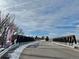 View of a bridge leading into the community at 42976 Colonial Trl, Elizabeth, CO 80107