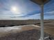 View from covered patio showcasing a sunny landscape at 42976 Colonial Trl, Elizabeth, CO 80107