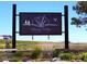 Entrance sign to Spring Valley Golf Club; showcasing its logo against a serene landscape at 42976 Colonial Trl, Elizabeth, CO 80107