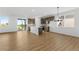 Expansive kitchen with center island, stainless appliances, modern cabinets, and sleek flooring creating a culinary enthusiast's dream at 761 Muturu Rd, Johnstown, CO 80542