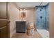 Cozy bathroom featuring a modern vanity and tiled walk-in shower at 776 Hilltop Rd, Palmer Lake, CO 80133