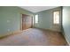 Bright bedroom with a large closet and cozy carpet at 776 Hilltop Rd, Palmer Lake, CO 80133