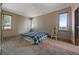 Comfortable bedroom with carpet, bright windows, and a cozy atmosphere at 776 Hilltop Rd, Palmer Lake, CO 80133