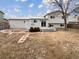 Backyard with deck, retaining wall, and storage shed at 10968 Grange Creek Dr, Thornton, CO 80233