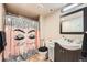 Bathroom featuring a vanity with sink, toilet and shower tub at 16519 E Hialeah Dr, Centennial, CO 80015