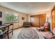 Spare bedroom with a large window and closet at 16519 E Hialeah Dr, Centennial, CO 80015