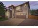 Beautiful two story home with arched entryway and large garage at 16519 E Hialeah Dr, Centennial, CO 80015