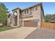 Beautiful two story home with arched entryway and large garage at 16519 E Hialeah Dr, Centennial, CO 80015