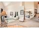 Bright and airy living room boasting vaulted ceilings and plush seating at 16519 E Hialeah Dr, Centennial, CO 80015