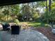 Secluded backyard with mature trees and lush landscaping, creating a peaceful and private outdoor retreat at 6930 S Delaware St, Littleton, CO 80120