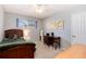 Bedroom with a window, wooden desk, and bed frame, creating a cozy and functional space at 6930 S Delaware St, Littleton, CO 80120