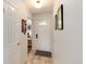 Bright entryway with tile flooring and coat closet, leading to other rooms in the house at 6930 S Delaware St, Littleton, CO 80120