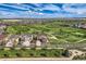 Gorgeous aerial view of house on golf course in a quiet neighborhood at 7658 S Country Club Pkwy, Aurora, CO 80016