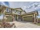 Charming home with 3-car garage, well-maintained lawn and appealing curb appeal at 7658 S Country Club Pkwy, Aurora, CO 80016