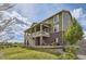 Beautiful exterior featuring an outdoor patio, and yard at 7658 S Country Club Pkwy, Aurora, CO 80016