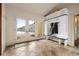 Mud room entryway with storage bench and view to snowy outdoors at 21609 Clarence Ln, Golden, CO 80401