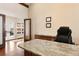 The office boasts granite countertops and plenty of natural light for working at home at 21609 Clarence Ln, Golden, CO 80401