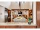 Well-appointed kitchen features a breakfast bar, modern appliances, and is open to the adjacent living room at 21609 Clarence Ln, Golden, CO 80401