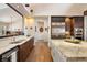 Well-equipped kitchen with stainless steel appliances, granite countertops, and hardwood floors at 21609 Clarence Ln, Golden, CO 80401