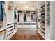 Spacious walk-in closet with custom shelving and drawers for optimal organization at 21609 Clarence Ln, Golden, CO 80401