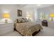 Cozy bedroom with neutral carpet, a large bed, and ample lighting for a comfortable retreat at 9278 E Aspen Hill Pl, Lone Tree, CO 80124