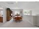 Upstairs dining area with natural light and built-in shelving at 9278 E Aspen Hill Pl, Lone Tree, CO 80124