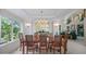 Elegant dining room featuring a large window and decorative lighting at 9278 E Aspen Hill Pl, Lone Tree, CO 80124
