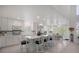 Bright, spacious kitchen with a large island and modern appliances at 9278 E Aspen Hill Pl, Lone Tree, CO 80124
