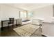 Bedroom featuring a daybed and desk with natural light at 5126 S Kenton Way, Englewood, CO 80111