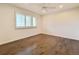 Spacious bedroom with hardwood floors and natural light at 5126 S Kenton Way, Englewood, CO 80111