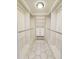 Walk-in closet with shelving and hexagonal tile floor at 5126 S Kenton Way, Englewood, CO 80111
