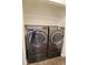 Modern LG washer and dryer appliances in a dedicated laundry area at 5126 S Kenton Way, Englewood, CO 80111