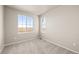 Bedroom featuring carpet flooring and a large window that offers great natural light at 5936 N Lisbon St, Aurora, CO 80019