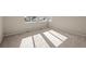 Bedroom filled with natural light features neutral walls and carpet at 5936 N Lisbon St, Aurora, CO 80019